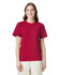 A red adult heavyweight T-shirt displayed on a model, featuring a crew neckline and short sleeves.