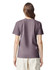 A back view of a women’s adult heavyweight t-shirt in a muted purple colour, featuring a logo.