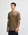 A unisex henley T-shirt in a muted brown colour, featuring a round collar and three-button placket.