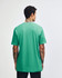 A unisex fine jersey short sleeve T-shirt in a vibrant turquoise colour, featuring a simple design and a branding logo.