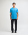 A unisex CVC short sleeve t-shirt in bright blue, worn with black cargo pants, featuring a casual style.