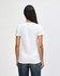 A white ladies' t-shirt with a fitted design, featuring a logo on the back, worn with blue jeans.