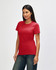 A red Gildan Softstyle ladies' T-shirt displayed on a model, featuring short sleeves and a fitted style.