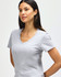 A light grey ladies' V-neck t-shirt displayed on a model, featuring a fitted silhouette and short sleeves.