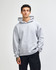 A grey unisex hooded sweatshirt featuring a front pocket and a logo on the chest.