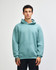 A unisex hooded sweatshirt in mint green with a front pocket and a brand logo.