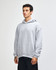 A grey unisex hooded sweatshirt with a kangaroo pocket and long sleeves, featuring a logo.