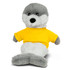 A grey seal plush toy wearing a bright yellow shirt, sitting with a friendly expression. It has a soft, cuddly texture.