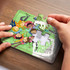 A colourful 12-piece wooden jigsaw puzzle featuring diverse cartoon characters being assembled by hands.