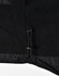Detail of a black fleece jacket featuring a drawstring adjustment at the hem. The jacket has a logo.