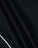 A close-up of a black polo shirt fabric with textured pattern and a contrasting white trim.