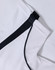 A white polo shirt with black accents, featuring a logo. The fabric has a textured, breathable appearance.