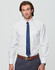 A white striped button-up shirt with long sleeves, featuring a chest pocket and paired with a blue tie.
