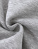 A close-up of soft, grey fabric with a slight texture, typical of a fleece jumper. It features a logo.
