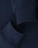 A navy crewneck sweatshirt featuring folded cuffs and a simple design, with a logo present.