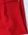 A close-up of a red fleecy hoodie featuring a full-zip and zippered pocket. The fabric appears soft and textured.
