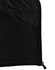 A close-up of the interior of a black softshell jacket, featuring a mesh pocket and zipper detail.