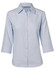 A light blue women's button-up shirt with 3/4 sleeves and a herringbone pattern, featuring a logo on the label.