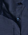 A navy blue ladies' button-up shirt with a pin dot pattern and a blue button. Features a classic collar design.