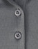 A grey polo shirt featuring two grey buttons on the collar, made from sustainable poly/cotton fabric.