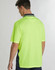 A unisex short-sleeve polo shirt in high-visibility yellow with navy detailing and a logo on the back.