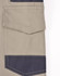 A close-up of unisex cotton stretch drill work shorts in khaki with navy blue detailing and pockets. Includes a logo.