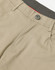 A close-up view of khaki flexi chino pants featuring a button closure and a grey waistband. The image includes a logo.