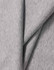A close-up of light grey cotton fabric, showcasing its soft texture and smooth finish. The fabric has a logo.