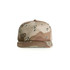A camo cap featuring a tan and brown pattern with a structured design and a logo on the front.