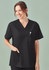 A unisex black V-neck scrub top featuring short sleeves and a pocket. The model is smiling against a soft green background.