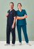 Two models wearing scrub tops in navy and teal, accompanied by matching pants. One model has a stethoscope.