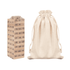 A wooden Genga block set in natural tones, accompanied by a beige drawstring bag. It features a logo.