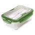 A lunch box with a transparent container and a green locking lid, featuring cutlery inside.