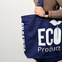 A navy recycled tote bag with a logo and text. It has sturdy handles and a spacious design.
