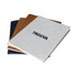 A set of three A5 notebooks, featuring white, brown, and navy covers, each with a logo.