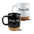 A mug set featuring black and white mugs with cork bases and branding.