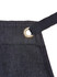 A dark denim bib apron featuring a metal grommet for adjustable ties. It includes a branding logo.