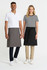 Two models wearing aprons, one in grey and the other in black, standing side by side. Both models are dressed in casual attire.