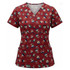 A women's Christmas scrub top in a festive red colour featuring various holiday-themed designs and a logo.