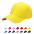 A yellow cotton sandwich cap with a curved brim, featuring a logo, accompanied by various coloured caps beneath it.