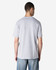 A grey Gildan Softstyle adult enzyme wash no label T-shirt viewed from the back, featuring a plain design.