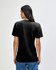 A black American Apparel tri-blend T-shirt viewed from the back, featuring a casual fit and soft fabric.
