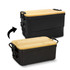 An expandable black lunch box with a bamboo lid, featuring a logo and clip closures on the side.