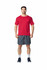 A man wearing a red Gildan Performance adult t-shirt and grey shorts, standing in a relaxed pose.