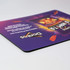A mouse mat featuring a vibrant purple design with an orange logo and branding elements.