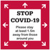 A floor decal sticker in red and white, featuring arrows and a message about maintaining social distance.