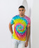 A vibrant tie-dye adult T-shirt featuring swirling colours of pink, yellow, blue, and green, with a logo.
