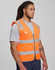 An orange high-visibility safety zip vest featuring reflective stripes and an ID pocket, worn by a model.