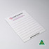 A white magnetic whiteboard featuring lined sections and a logo in the corner. It has a smooth, glossy finish.