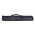 A black carrying case for a roll-up banner, featuring a handle for easy transport.